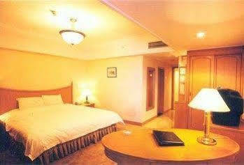 Jin'Gu Hotel Harbin Quarto foto